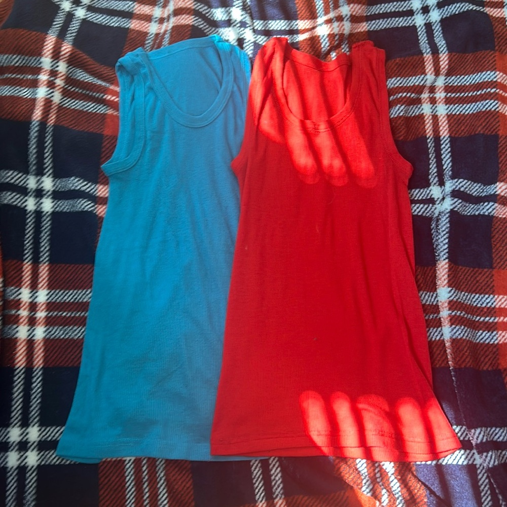 Two pairs of tank tops blue and red in a size medium